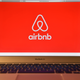 The Airbnb logo is displayed on a computer screen Aug. 3, 2016, in London.
Carl Court/Getty Images